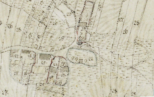 Detailierte alte Stadtkarte, die Geböude, Straße und Text zeigt, mit einer geplanten Entwicklung am unteren Rand.