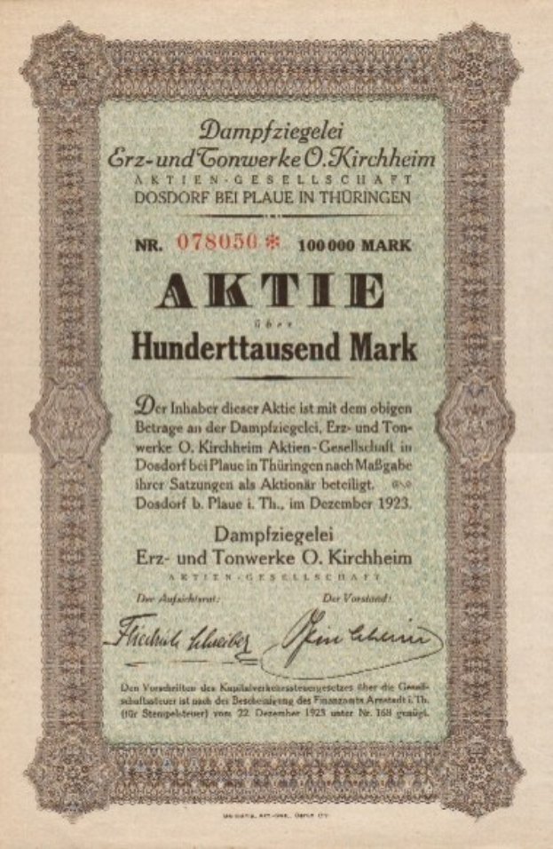 Ein altes deutsches Aktienzertifikat mit einem Porträt eines Mannes und Text zur Herkunft der Aktie.