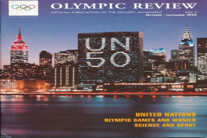 Buch mit dem Titel "Olympische Spiele-Rezension Offizielle Veröffentlichung der Olympischen Bewegung" mit einer Stadtansicht auf dem Cover, das auf einer flachen Oberfläche liegt.
