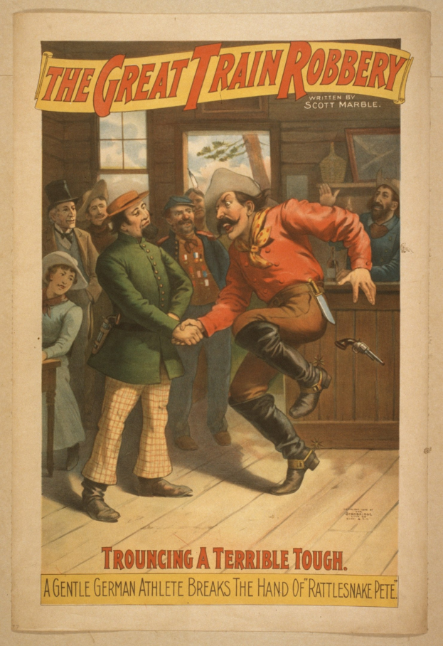 Plakat zeigt eine Gruppe von Menschen, von denen einer eine Waffe hält, ein Fenster und eine Wand im Hintergrund und den Text "Der große Zugraub - Trouching a Terrible Tough" oben und unten.