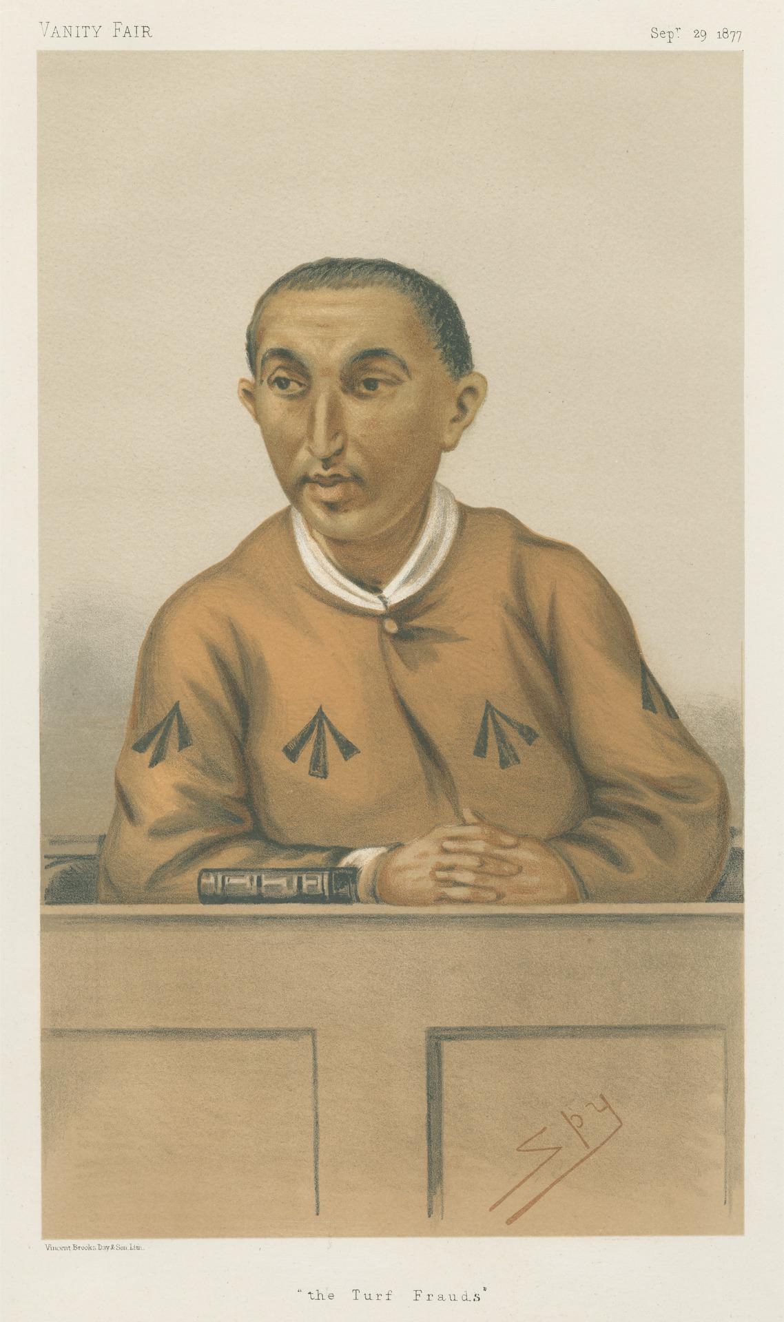 Ein Mann in einem weißen Hemd und dunklen Hosen sitzt an einem Tisch und hat die Hände gefaltet, sieht ernst aus, mit dem Text "Die Rasenbetrüger" unten.