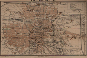 Ein detaillierter alter Stadtplan von Weimar, Deutschland, mit Text oben und unten, der Straßen, Gebäude und Sehenswürdigkeiten zeigt.