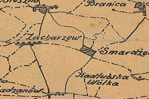 Ein detaillierter alter Stadtplan von Zacharzew, Polen, der Straßen, Gebäude, Sehenswürdigkeiten und Text enthält, der Informationen über die Bevölkerung, Straßen und Sehenswürdigkeiten der Stadt bereitstellt.